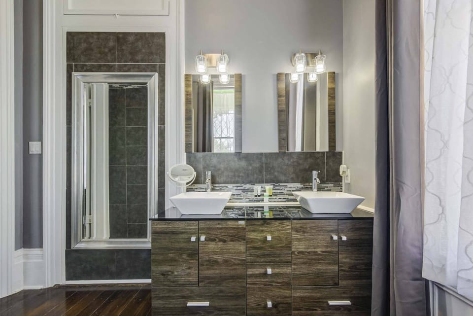 The Grey Suite | Bathroom | Designer toiletries, hair dryer, bathrobes, slippers