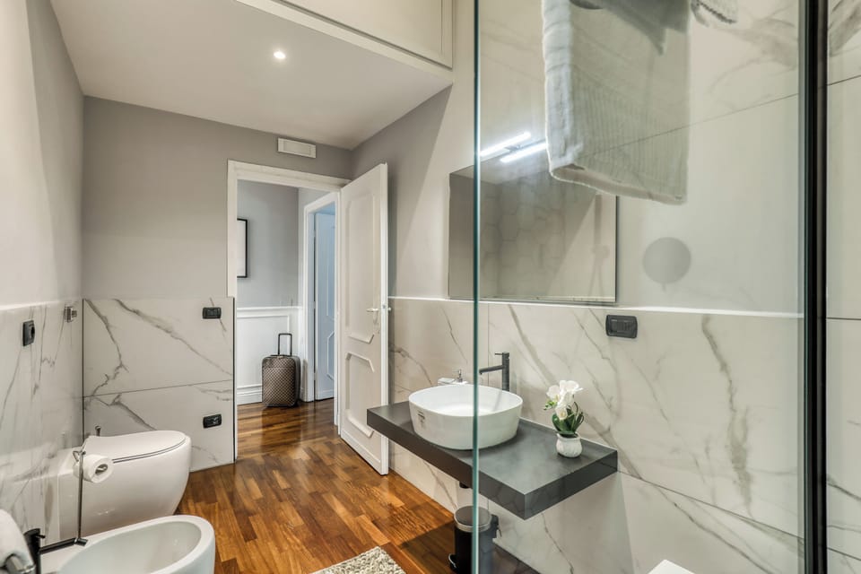 Apartment, 1 Bedroom, Patio | Bathroom amenities | Hair dryer, bidet, soap, shampoo