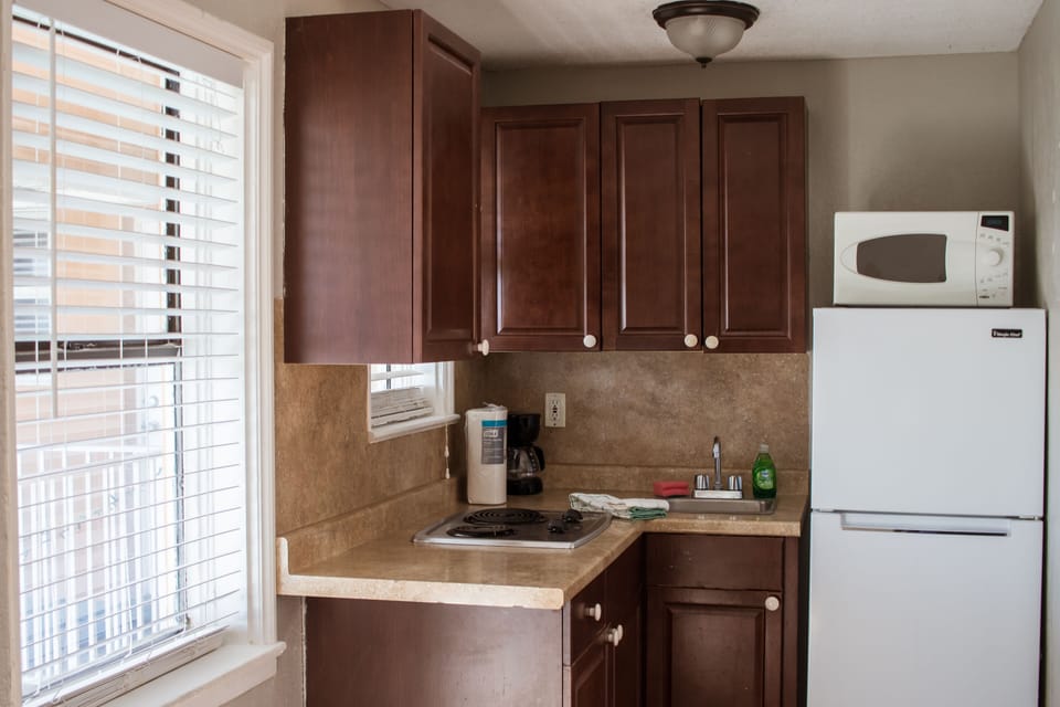 Room, 2 Queen Beds | Private kitchenette | Full-size fridge, microwave, stovetop, coffee/tea maker