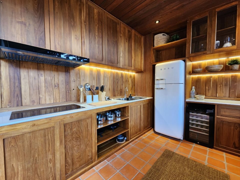 Mini-fridge, electric kettle, paper towels