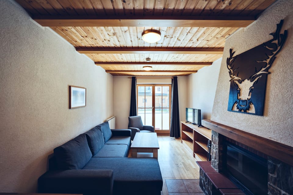 Superior Apartment, 1 Bedroom, Balcony, Resort View | Living area | TV, fireplace