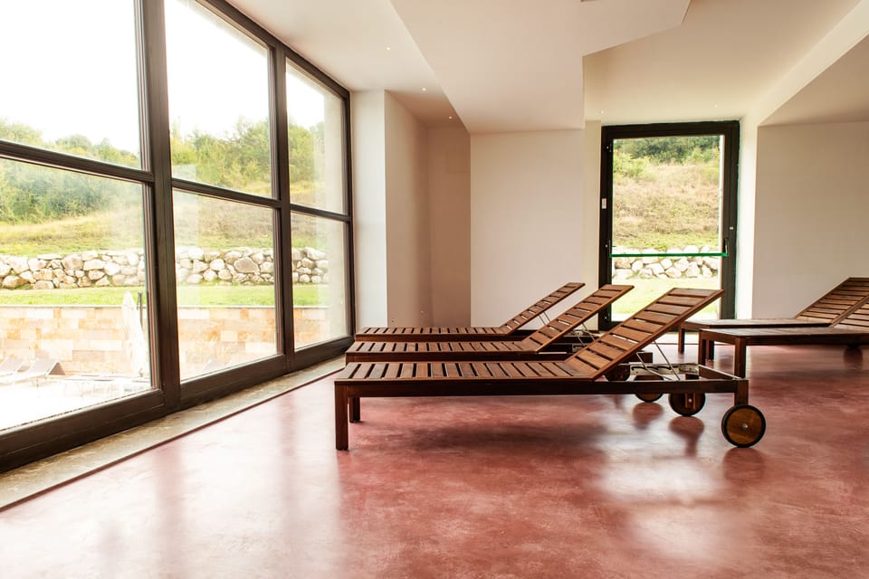 Indoor pool, seasonal outdoor pool, pool umbrellas, sun loungers