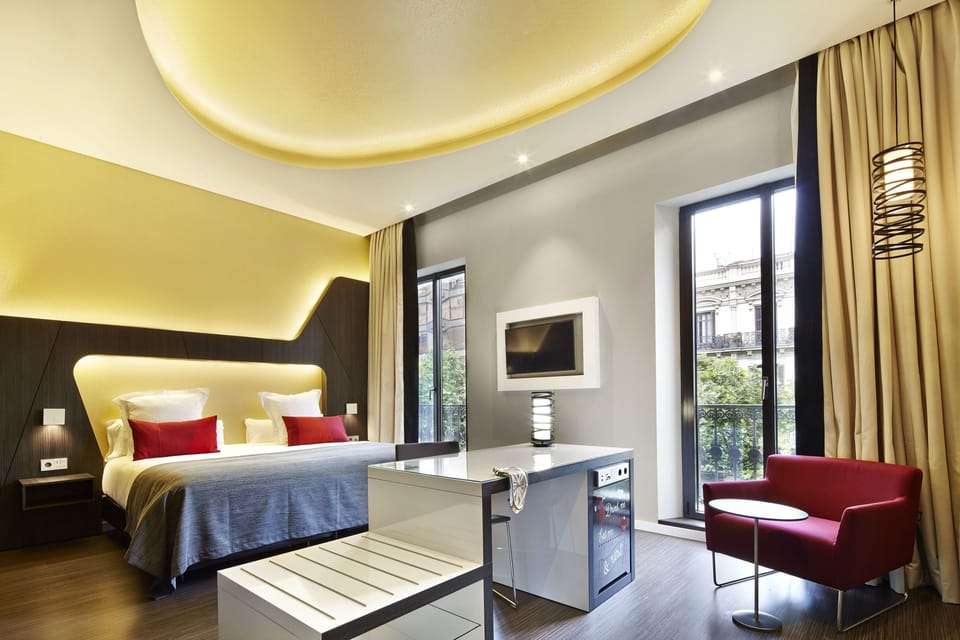 Premium bedding, down comforters, minibar, in-room safe