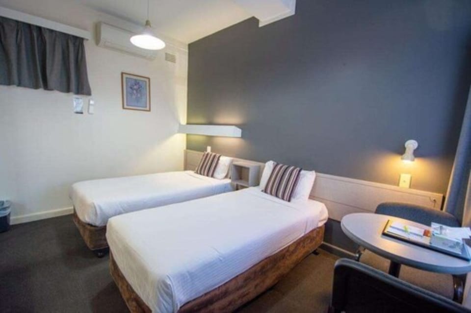 Budget Twin Room | Blackout drapes, iron/ironing board, free WiFi, bed sheets