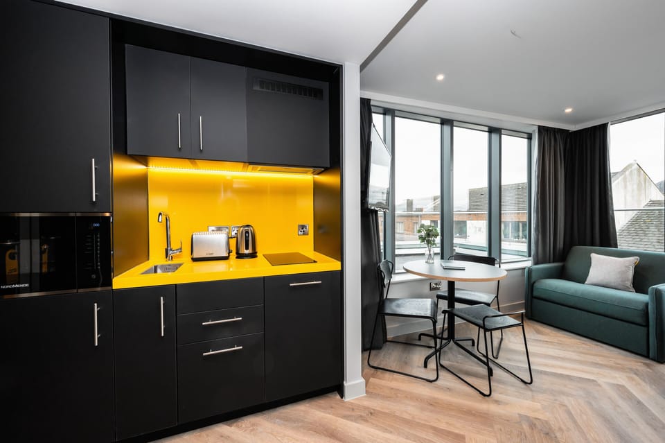 Studio Apartment | Private kitchenette | Full-size fridge, microwave, oven, dishwasher