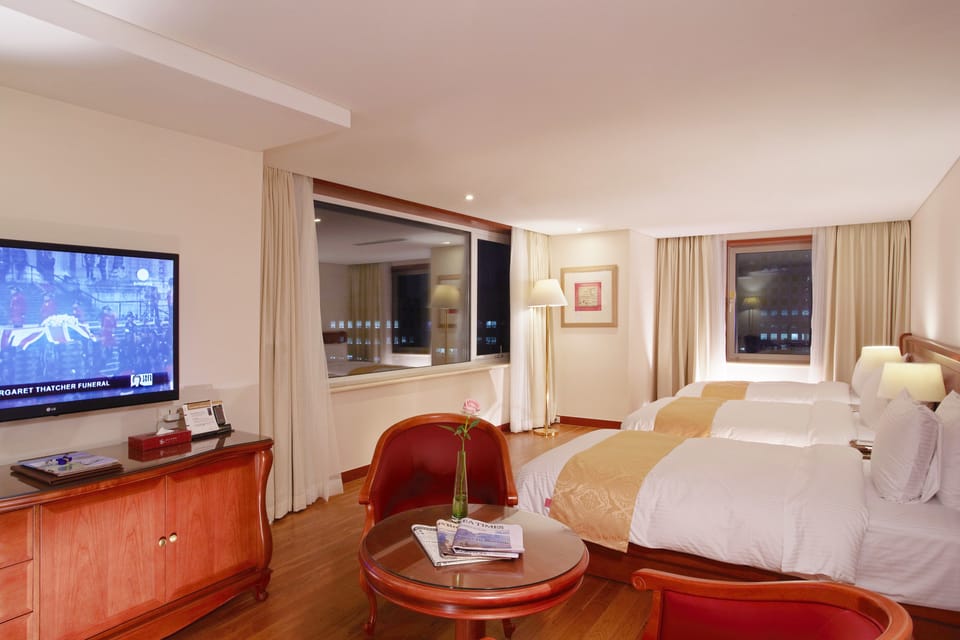 Deluxe Triple Room | Premium bedding, down comforters, in-room safe, laptop workspace