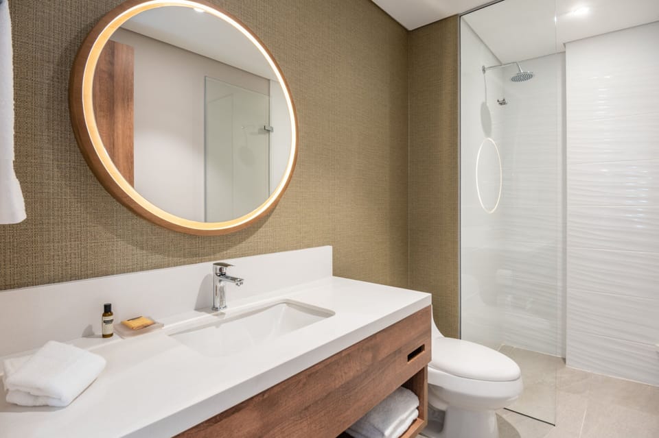 Standard Double Room, 2 Queen Beds | Bathroom | Shower, rainfall showerhead, free toiletries, hair dryer
