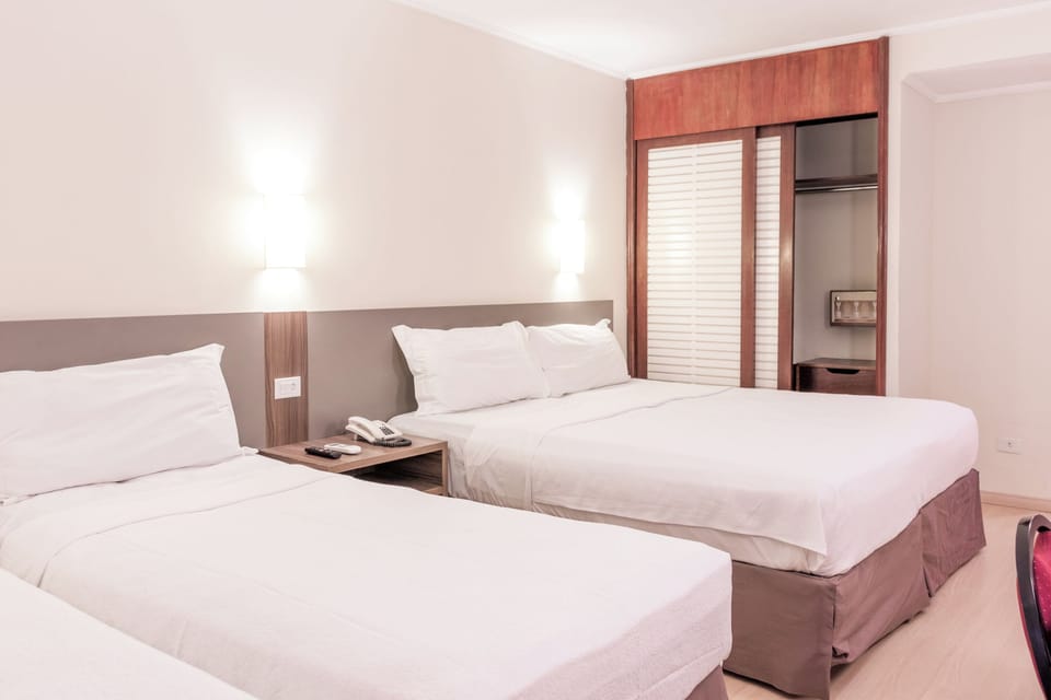 Deluxe Quadruple Room | Minibar, in-room safe, desk, free WiFi