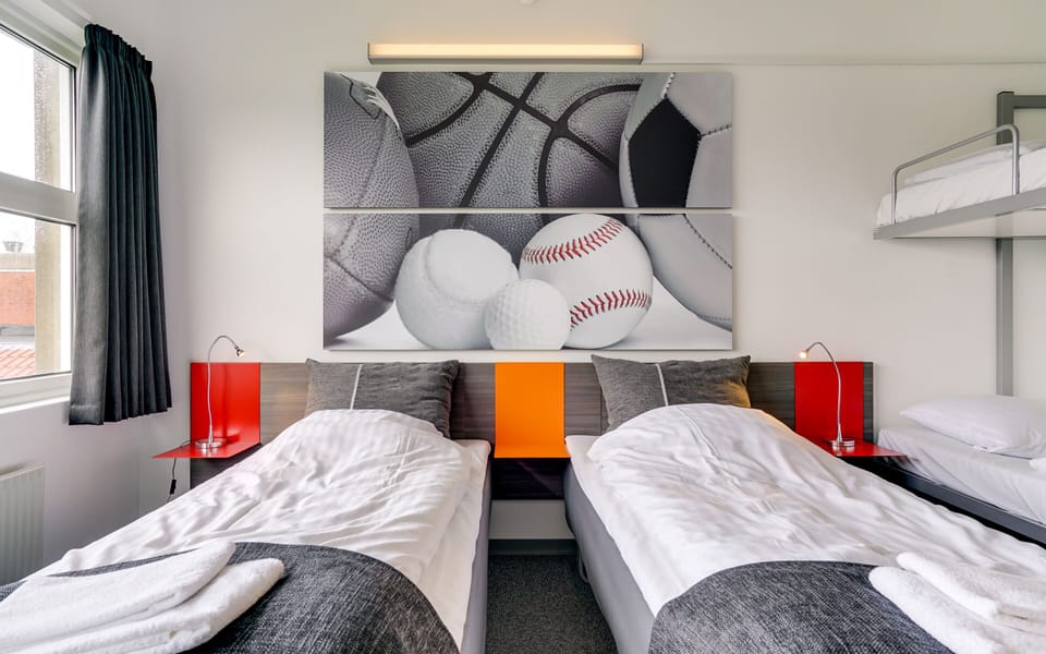 Hypo-allergenic bedding, desk, blackout drapes, soundproofing
