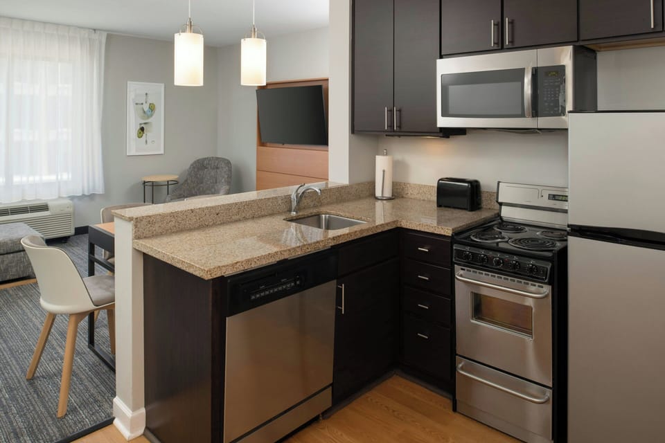 Suite, 2 Bedrooms | In-room safe, laptop workspace, iron/ironing board