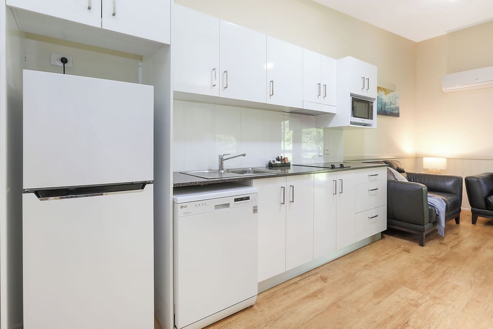 Standard Cabin - Sleeps 4 | Private kitchen | Coffee/tea maker, full-size fridge, microwave, stovetop