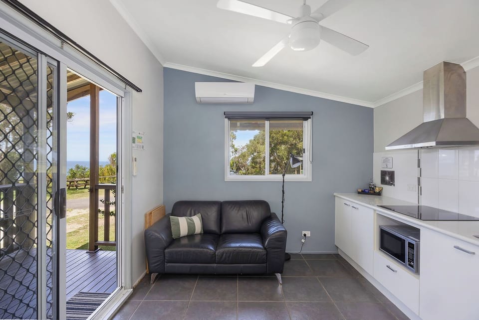 Standard Cabin - Sleeps 4 - Dog Friendly | Living area | LCD TV, pay movies