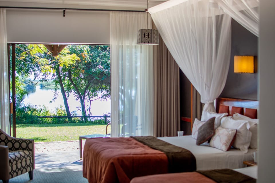 Double Room, River View | In-room safe, desk, iron/ironing board (on request), WiFi (free)
