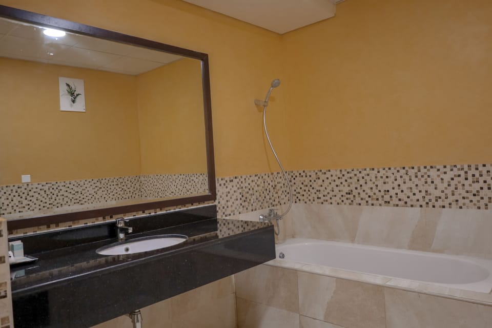 Family Studio Suite | Bathroom | Slippers