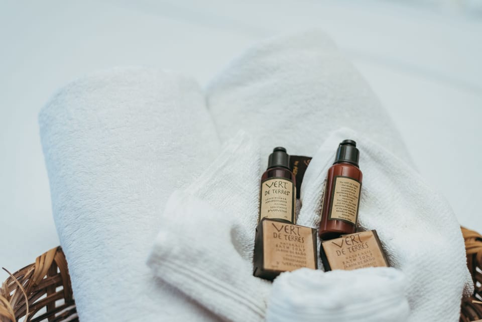 Shower, towels, soap, shampoo
