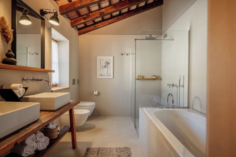 Hydromassage showerhead, free toiletries, hair dryer, bathrobes