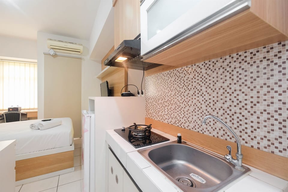 Fridge, stovetop, cookware/dishes/utensils