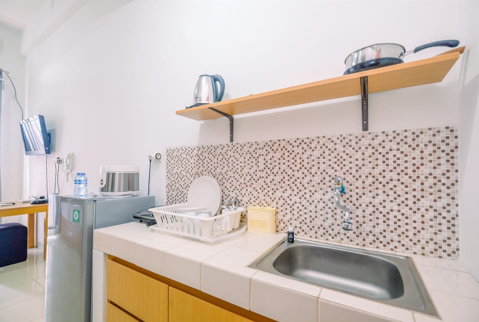 Fridge, stovetop, cookware/dishes/utensils