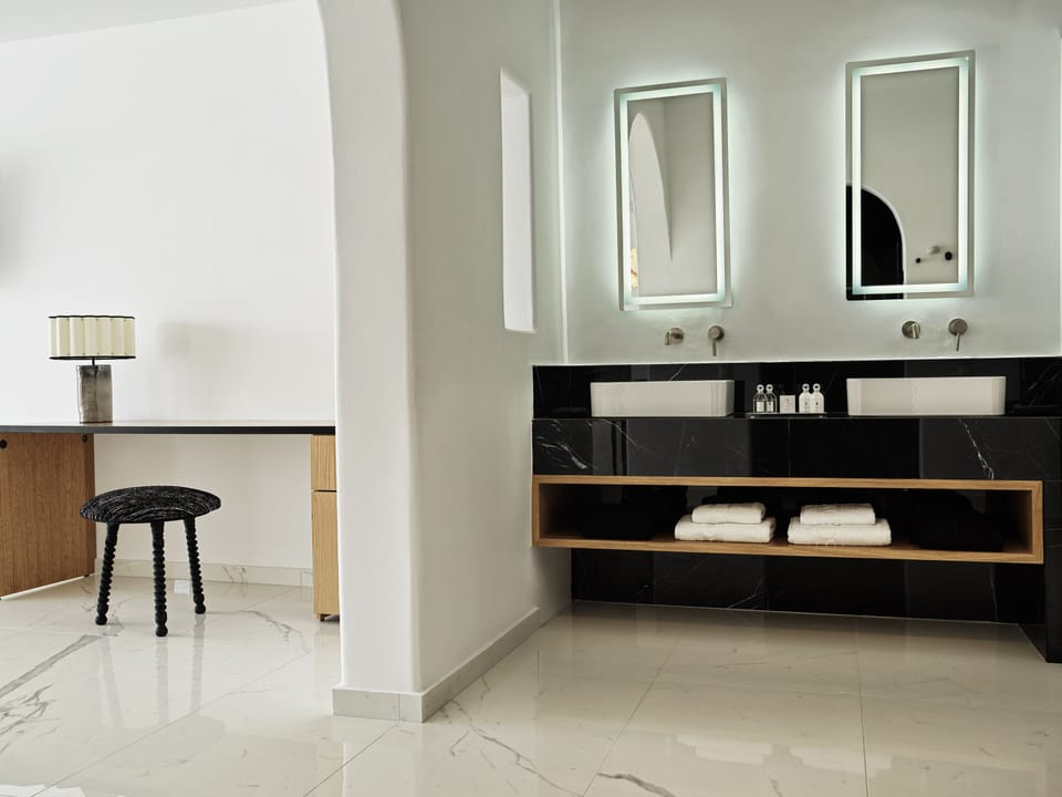 Shower, designer toiletries, hair dryer, bathrobes