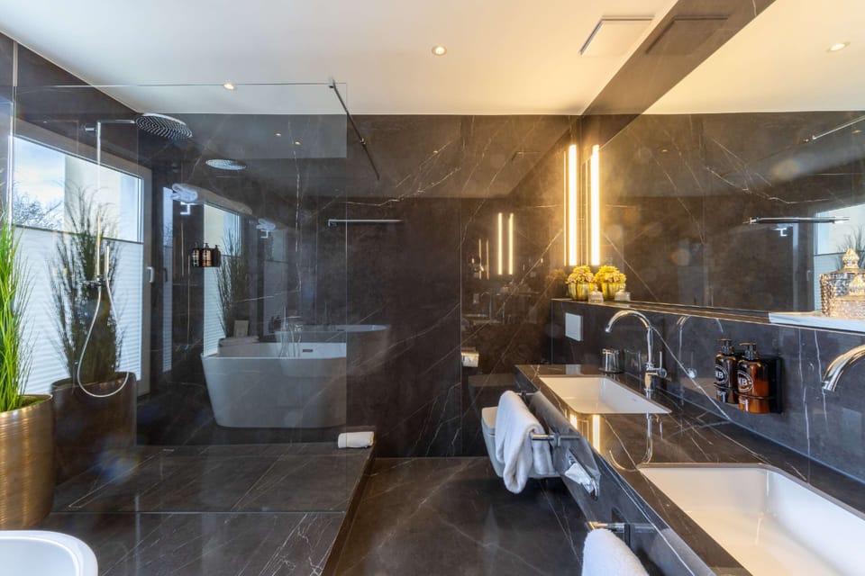 Standard Room, 1 King Bed (Dining Table;Penthouse) | Bathroom | Eco-friendly toiletries, hair dryer, bathrobes, slippers