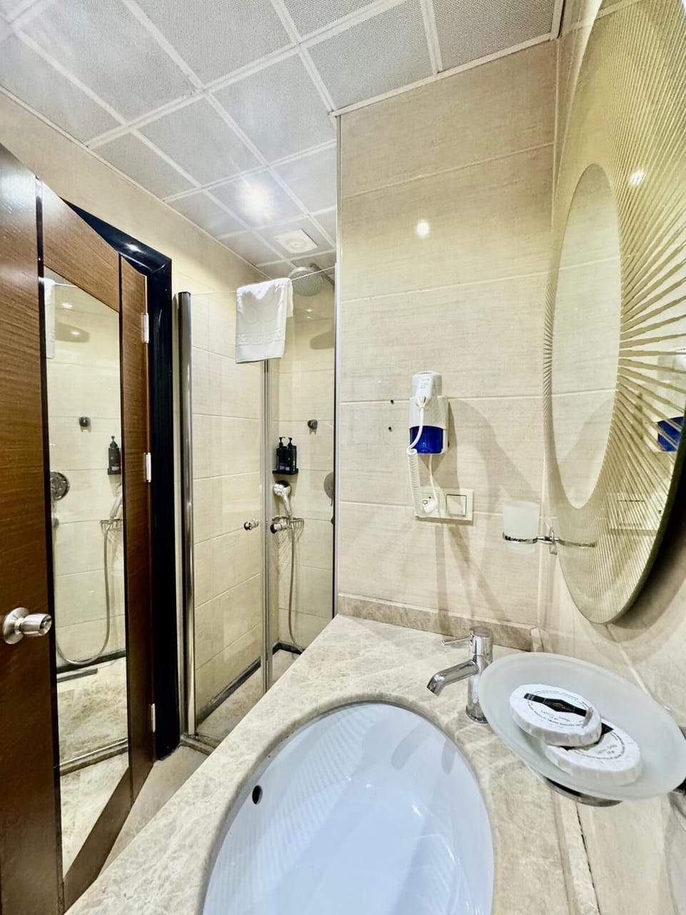 Shower, free toiletries, hair dryer, slippers