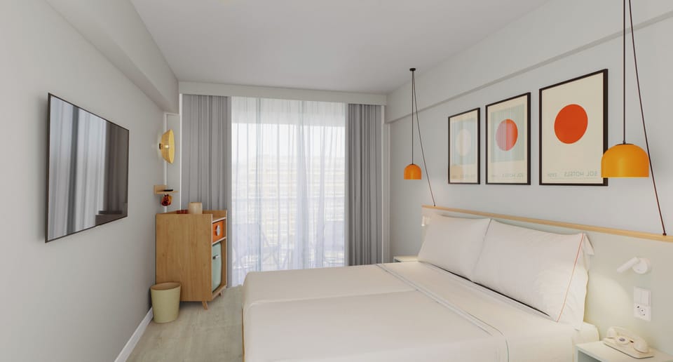 Junior Suite | Down comforters, in-room safe, blackout drapes, free WiFi