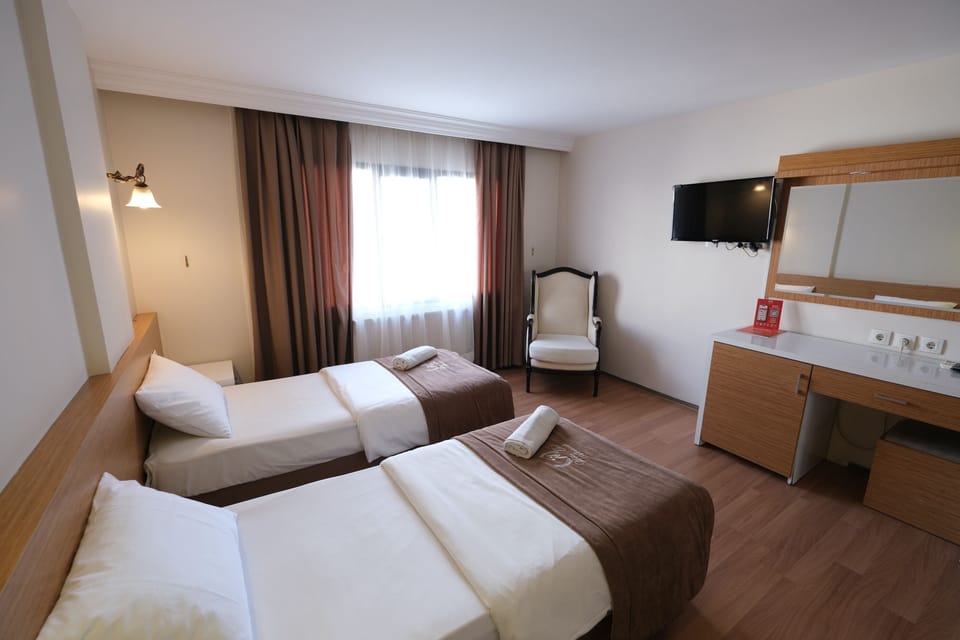 Standard Triple Room | Premium bedding, minibar, free WiFi, bed sheets