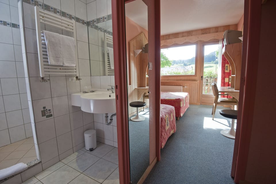 Shower, hair dryer, bathrobes, towels