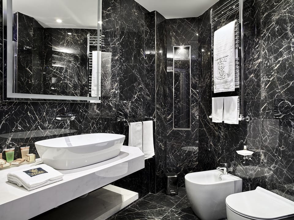 Free toiletries, hair dryer, slippers, bidet
