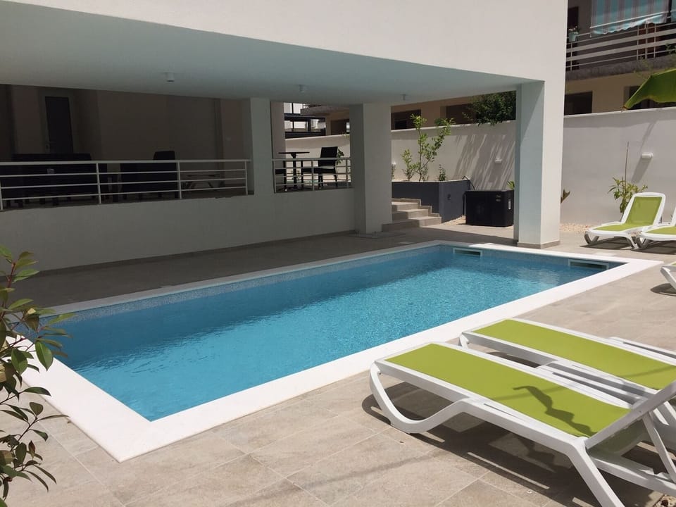 Seasonal outdoor pool, pool umbrellas, sun loungers