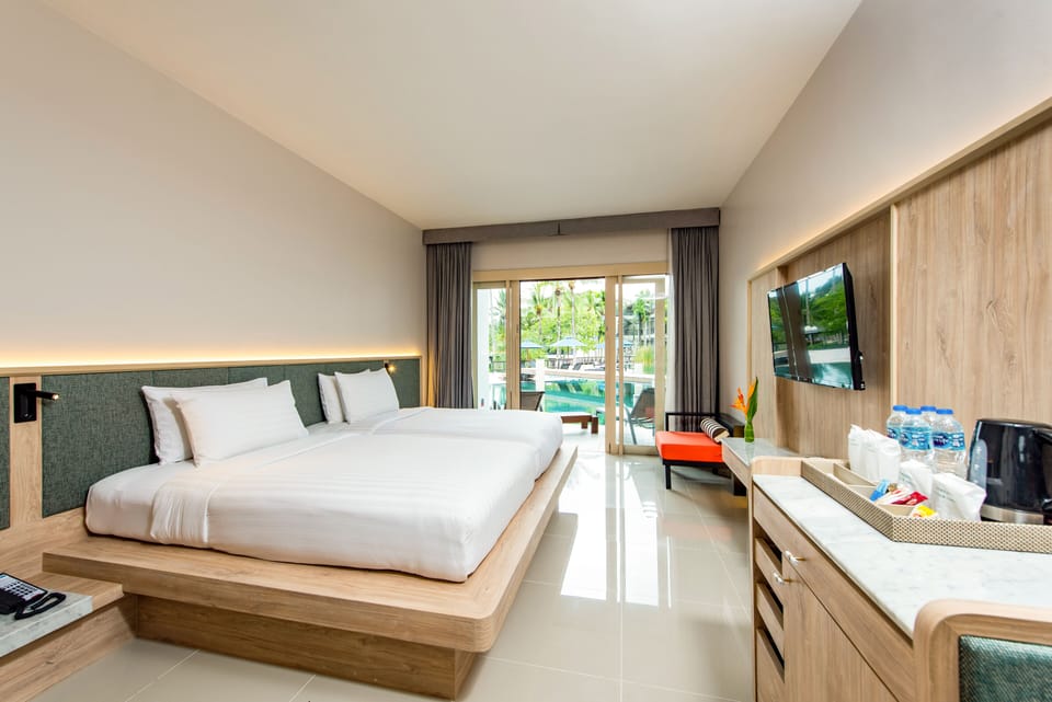 Deluxe Pool Access Room | In-room safe, individually furnished, desk, laptop workspace
