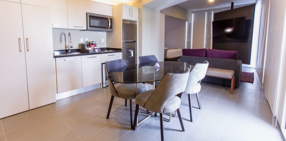 Room, 1 Queen Bed, Kitchenette, City View | Private kitchen | Coffee/tea maker, full-size fridge, microwave, stovetop