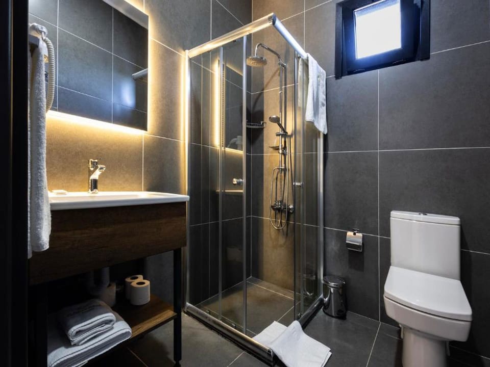 Shower, rainfall showerhead, eco-friendly toiletries, hair dryer