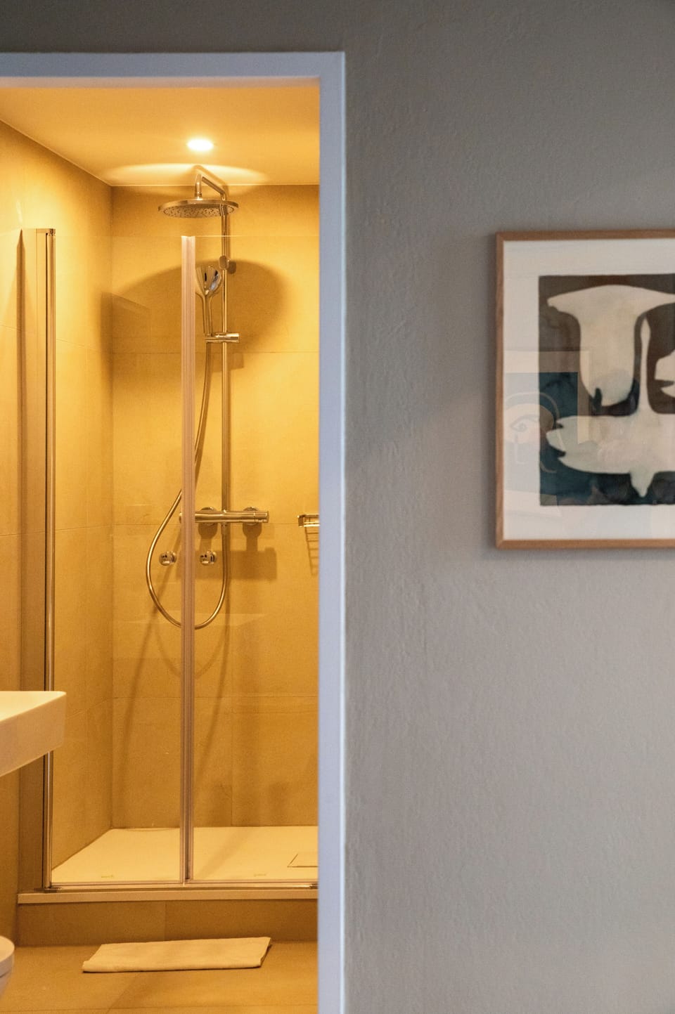 Shower, hair dryer, slippers, towels