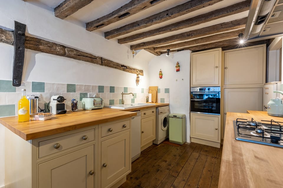 Comfort Cottage | Private kitchen | Highchair