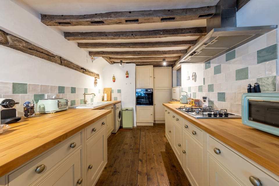 Comfort Cottage | Private kitchen | Highchair
