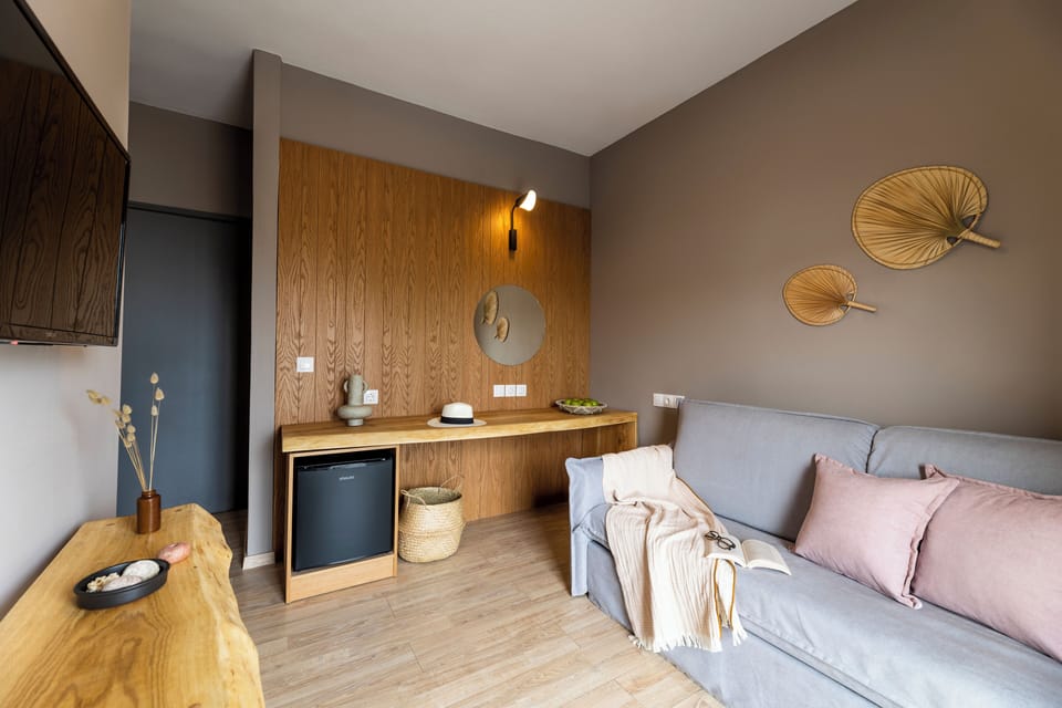 Standard Suite, 1 Bedroom, Balcony, City View | Living area | 32-inch flat-screen TV with digital channels