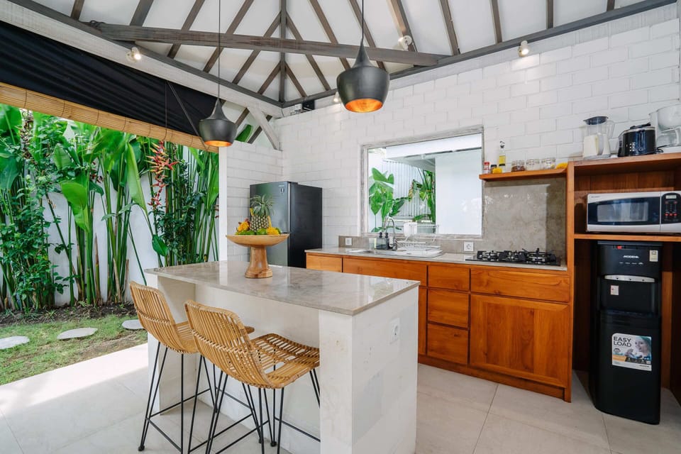 Basic Villa, 2 Queen Beds | Private kitchen | Fridge, microwave, stovetop, coffee/tea maker