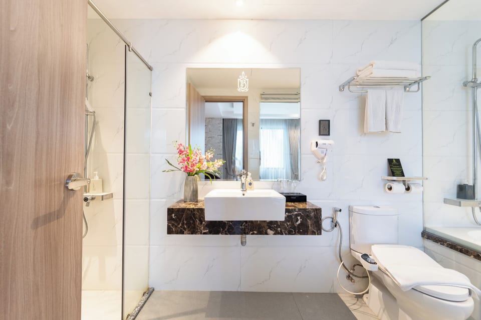 Family Room, Bathtub, City View | Bathroom | Separate tub and shower, rainfall showerhead, free toiletries