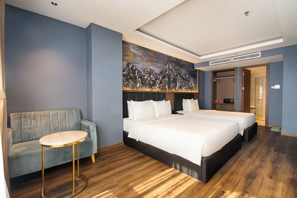 Premier Triple Room, Bathtub, City View | Hypo-allergenic bedding, memory foam beds, minibar