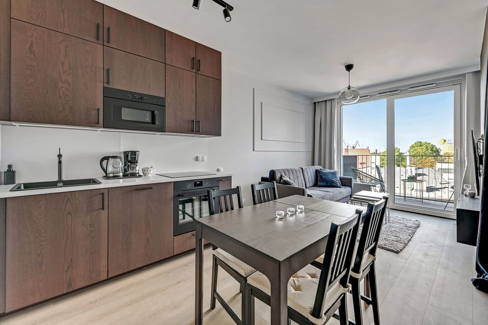 Executive Apartment | Private kitchen | Full-size fridge, stovetop, dishwasher, coffee/tea maker
