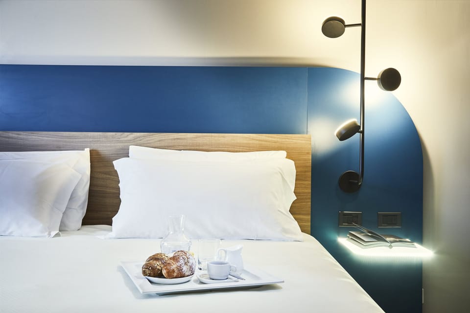 Superior Suite | Minibar, desk, laptop workspace, blackout drapes