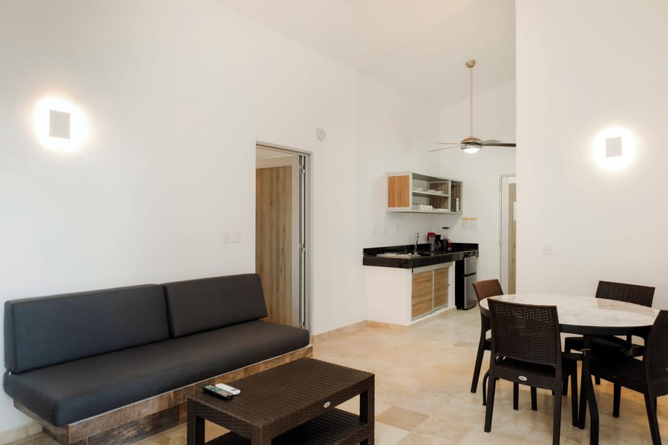 Suite, 1 Bedroom, Terrace, Sea Facing | In-room safe, laptop workspace, blackout drapes, iron/ironing board
