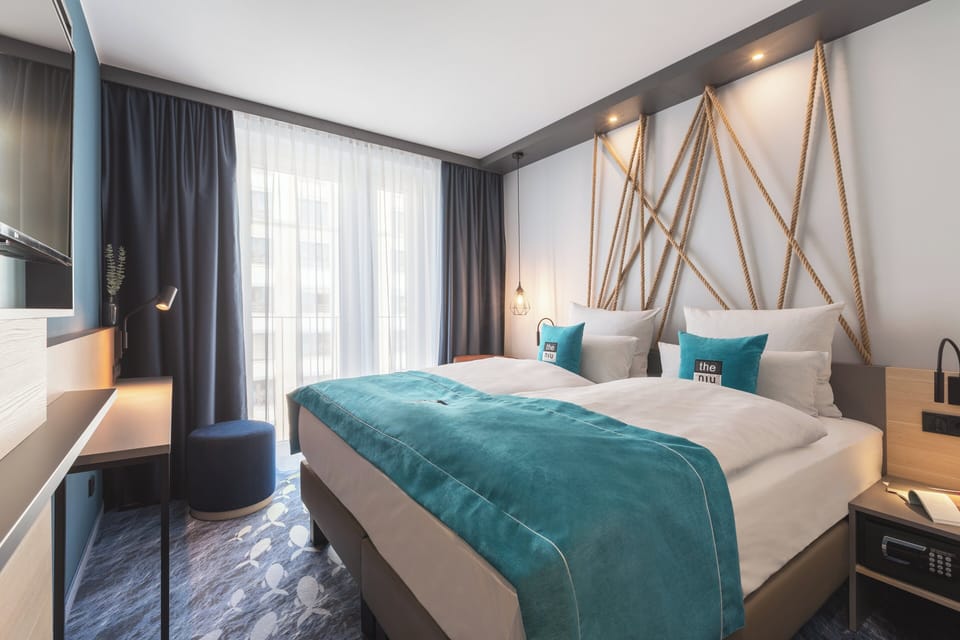 In-room safe, laptop workspace, blackout drapes, soundproofing