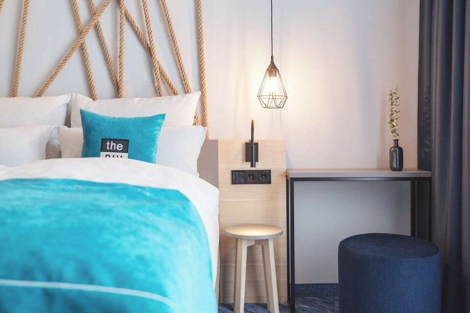 In-room safe, laptop workspace, blackout drapes, soundproofing