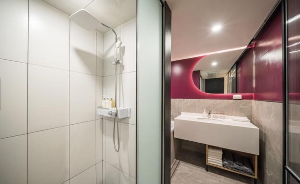Deluxe Double Room | Bathroom | Shower, designer toiletries, hair dryer, slippers
