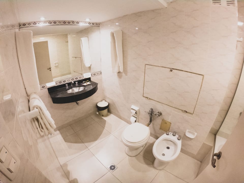 Family Quadruple Room | Bathroom | Combined shower/tub, free toiletries, hair dryer, bidet