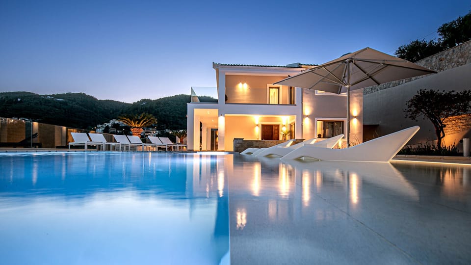 Outdoor pool, a heated pool, pool umbrellas, sun loungers