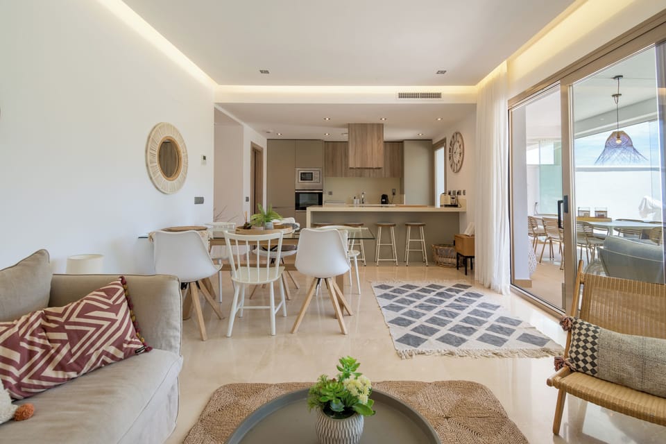 Apartment | Living area | 30-inch TV with cable channels