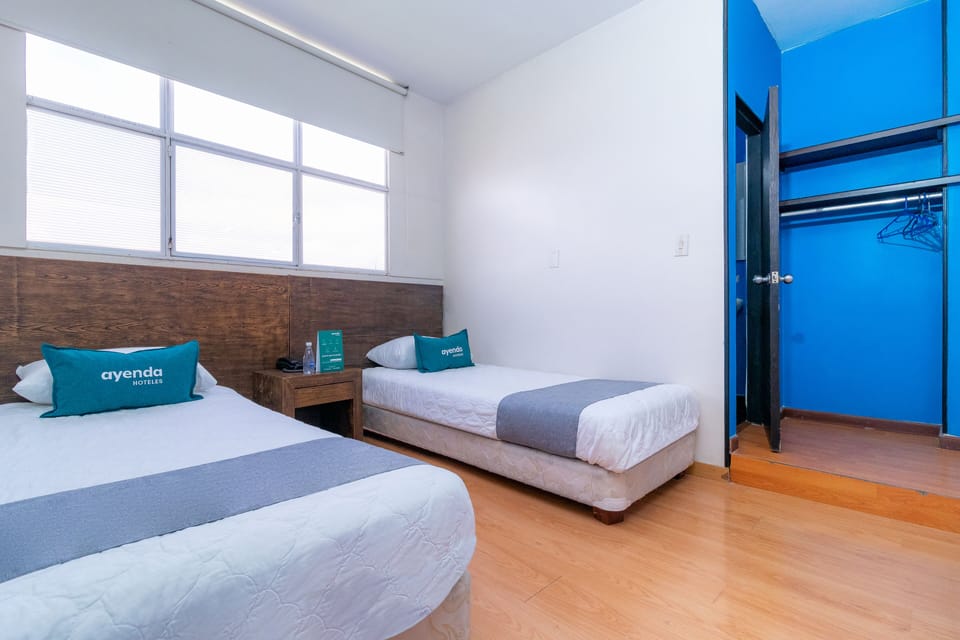 Twin Room | Hypo-allergenic bedding, iron/ironing board, free WiFi, bed sheets